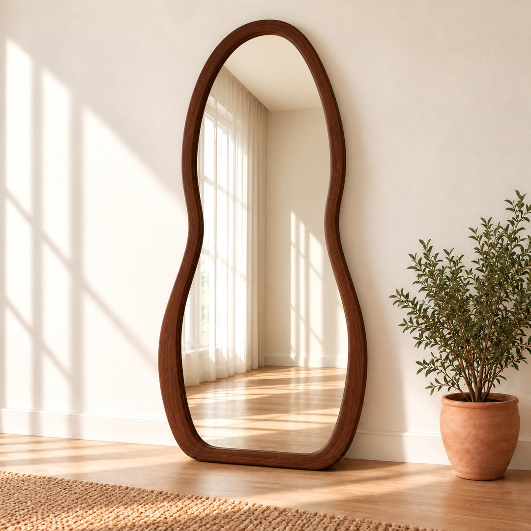 Wavy Asymmetrical Full Length Mirror – Wooden Floor Mirror in a digitally styled neutral room with greenery.
