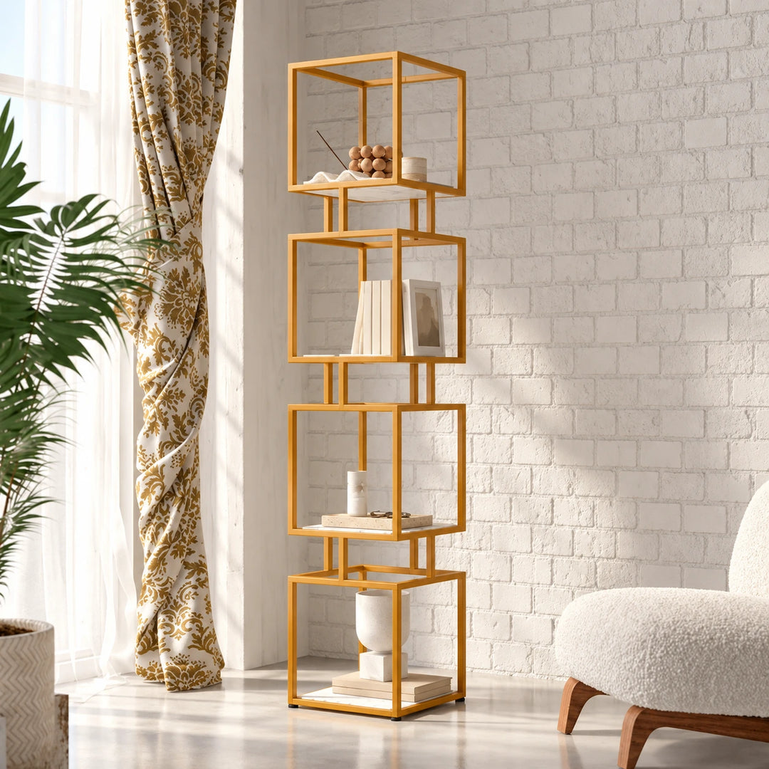 Cubic Tower bookcase in Akil Gold powder coat with four white marble MDF shelves beside a sunlit window