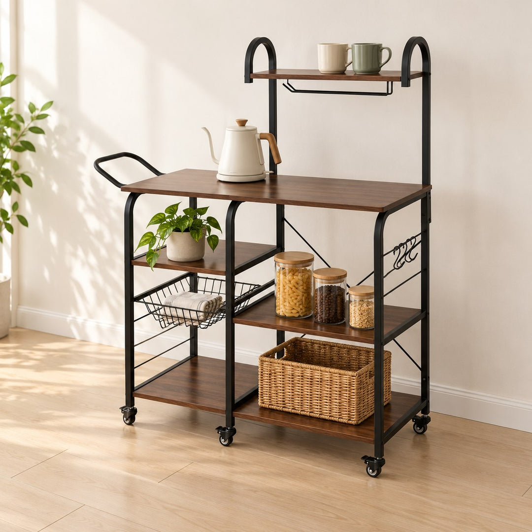Kolata brown wood kitchen rack with black frame, upper hutch, wire basket and wheels against a kitchen wall