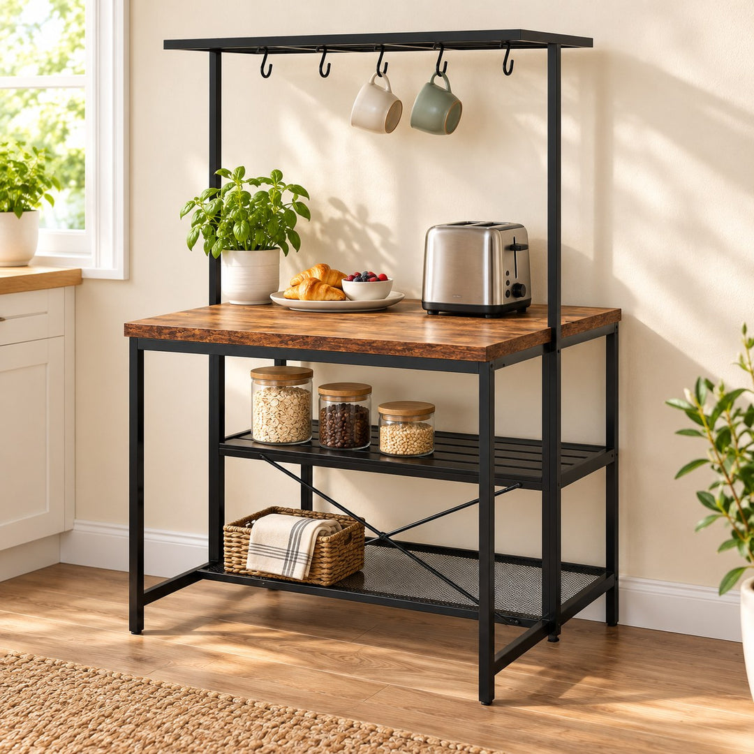 Morah brown wood and black metal kitchen rack with overhead hooks against a kitchen wall with everyday kitchen props and green plant