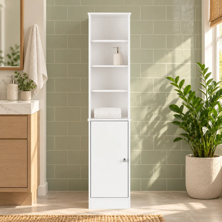 White bathroom storage tower with four open compartments and lower cabinet styled with a plant