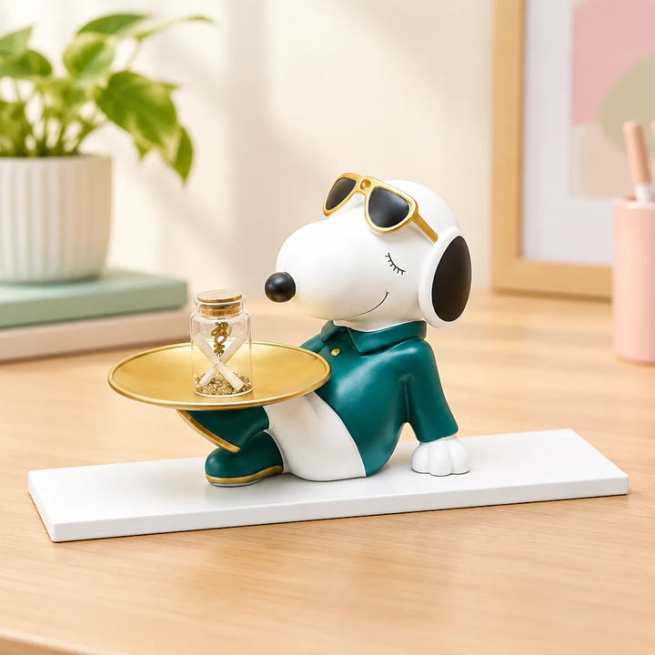 White puppy decor figurine in green jumper and sunglasses holding gold tray on marble base