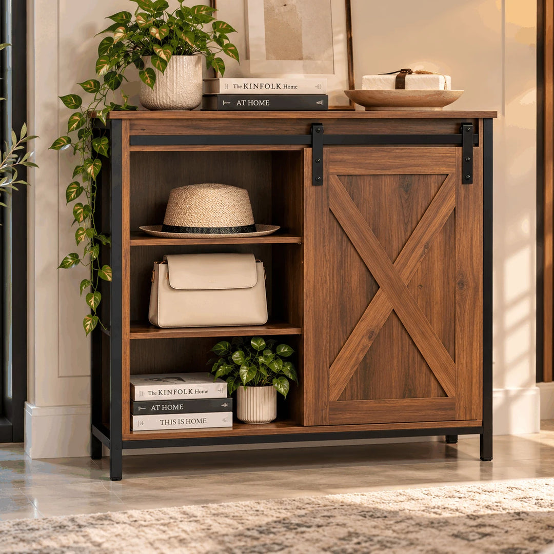 Brown side cabinet with a sliding barn-style door and open storage shelves