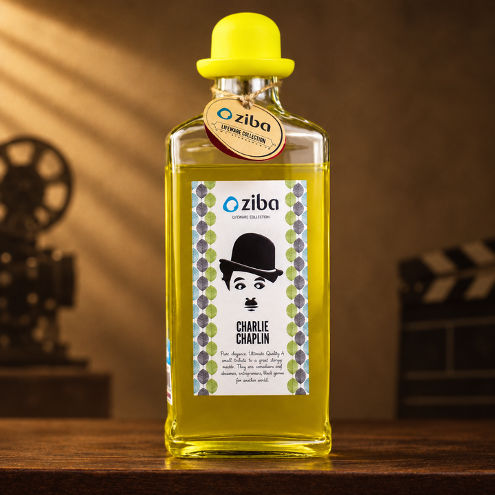 Vintage gentleman glass bottle with yellow hat stopper on wooden table beside film clapper