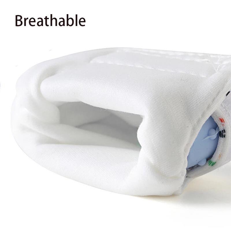 Close-up of breathable white fabric lining inside baby teething mitt