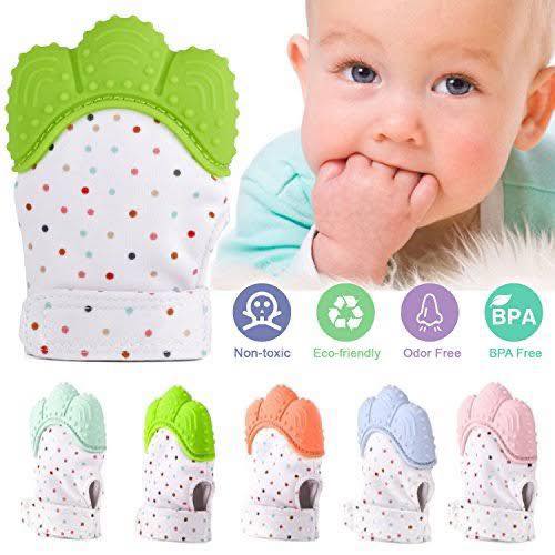 Baby chewing green silicone teething mitt with colour options shown below