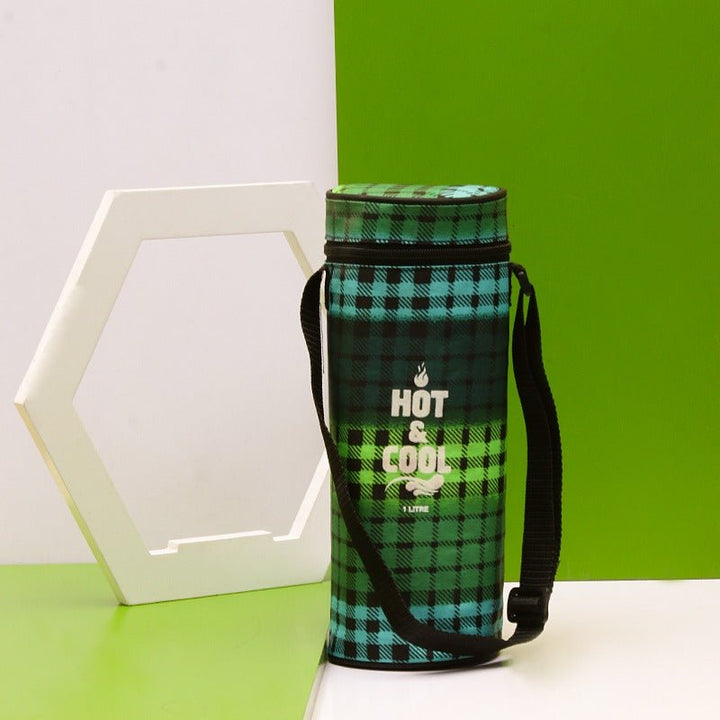 Green checked thermos storage bag with black shoulder strap on green backdrop