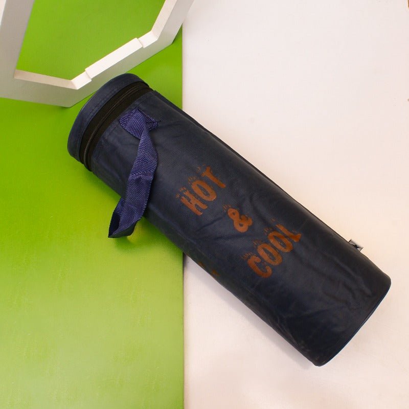 Dark navy thermos storage bag with orange print lying diagonally on white surface