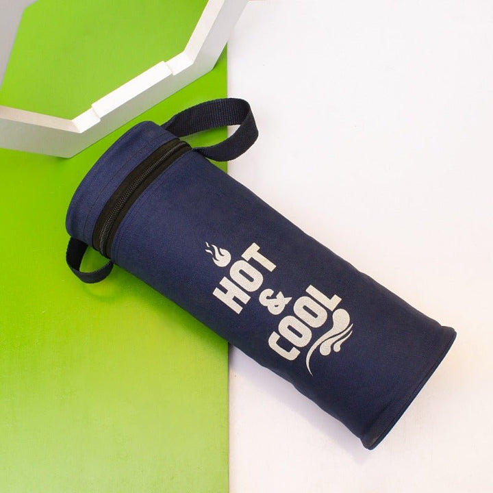 Navy blue insulated thermos storage bag lying tilted with shoulder strap visible