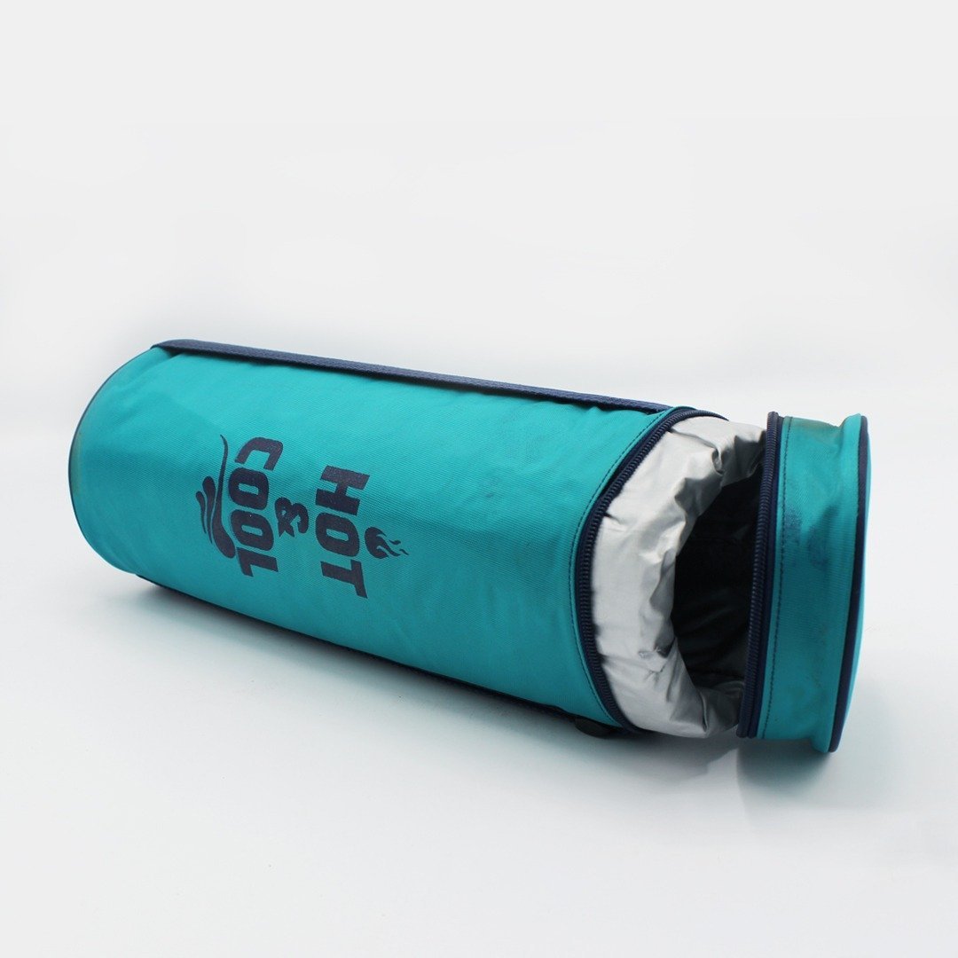 Teal thermos storage bag lying on its side with lid open showing white lining