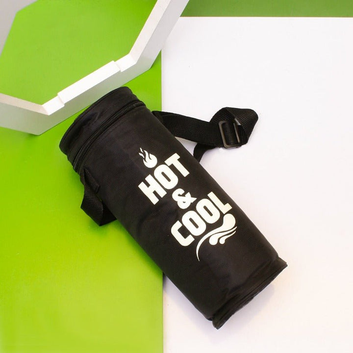 Black thermos storage bag with white print lying at an angle beside hexagon decor