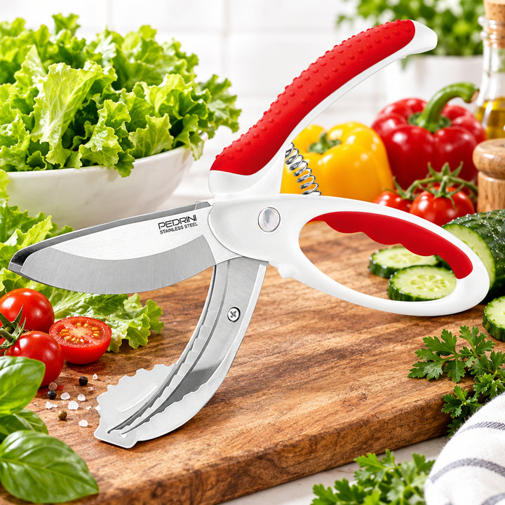Red and white handled salad scissors with stainless steel blades, open view