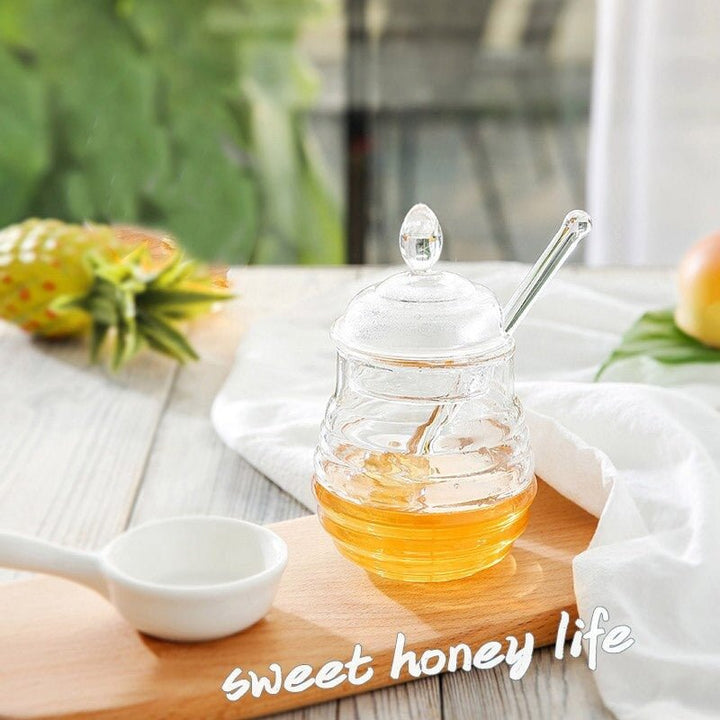Transparent Honey Storage Jar with Beehive Style Spoon | kitchen item | Waseeh Pakistan