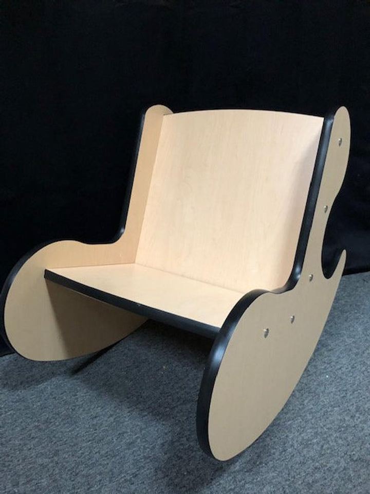 Front view of wooden whale rocker kids chair showing seat and backrest